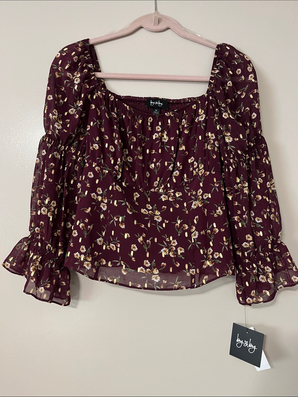 By & By beautiful top dark cherry and gold. Many details!!  NWT. Size M